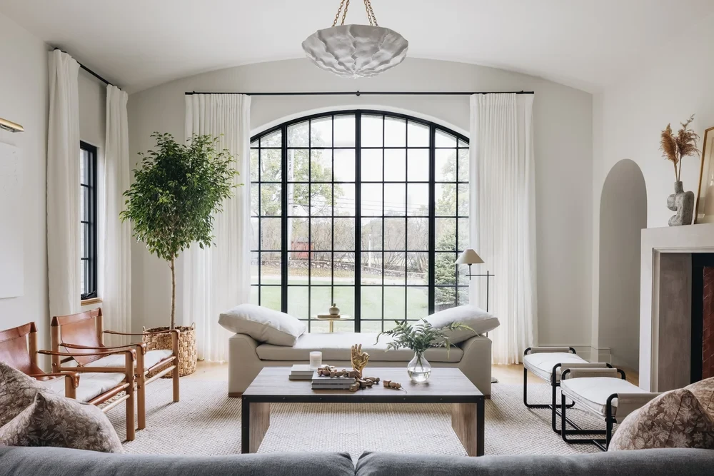 Modern living room with arched window
